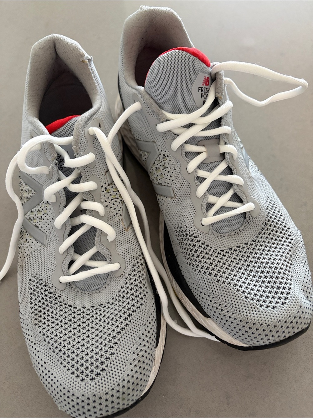 New Balance Men’s Light Grey Athletic Running Sneakers with Red Tongue Accent